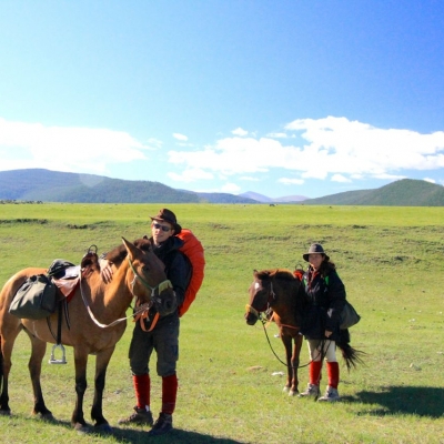 Horse Trekking - Two Tourists and Horses